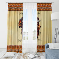Beige window curtains with African print and white sheer center panel, orange zigzag trim