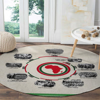Beige round carpet with central red globe and black African history timeline