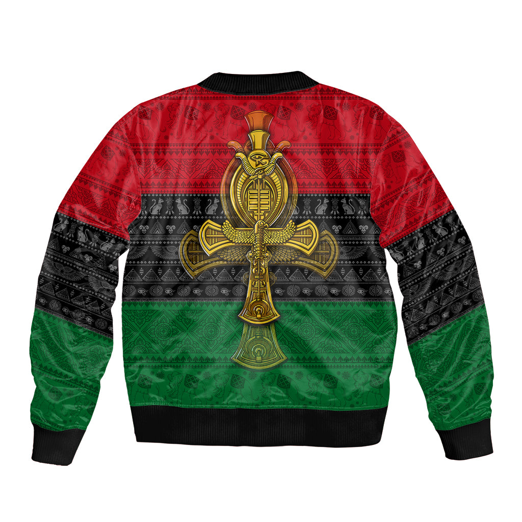 Unisex bomber jacket with gold Ankh cross on back, red/black/green patterned print