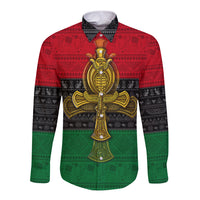 Ankh long-sleeve button shirt with red, green, and black print and gold emblem front