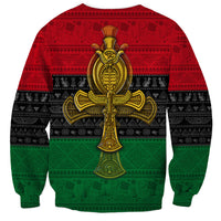 Unisex ankh sweatshirt with centered gold emblem print; red, black, and green pattern, back