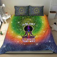 Bedding set with blue galaxy duvet, bright green mandala design, and two matching pillows