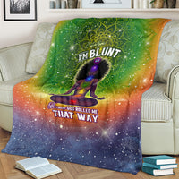 Green galaxy mandala yoga graphic blanket over couch with 'I'M BLUNT' logo
