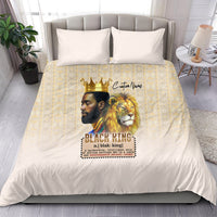 Beige duvet and two pillows with lion, crowned king portrait, and geometric gold pattern