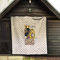 Beige large quilt with diamond quilting and “Black King” king and lion artwork