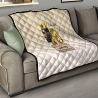 Beige diamond quilt draped on sofa with central “Black King” lion and king graphic