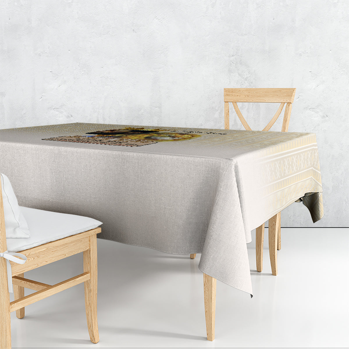 Beige tablecloth draped on rectangular table with matching skirt and corner fall