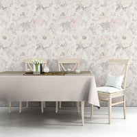Beige tablecloth on dining table with gold geometric trim and softly draped corners