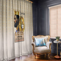 Beige printed window curtains with lion and king portrait, hanging beside a chair