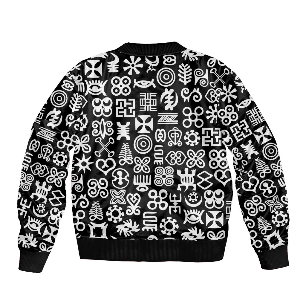 Black bomber jacket with all-over white geometric pattern, ribbed collar and cuffs