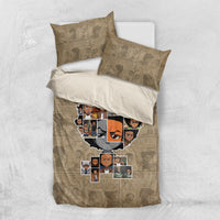 Beige bedding set with cartoon face collage duvet and folded white pillow.