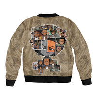 Beige bomber jacket with cartoon collage face graphic, ribbed cuffs and hem