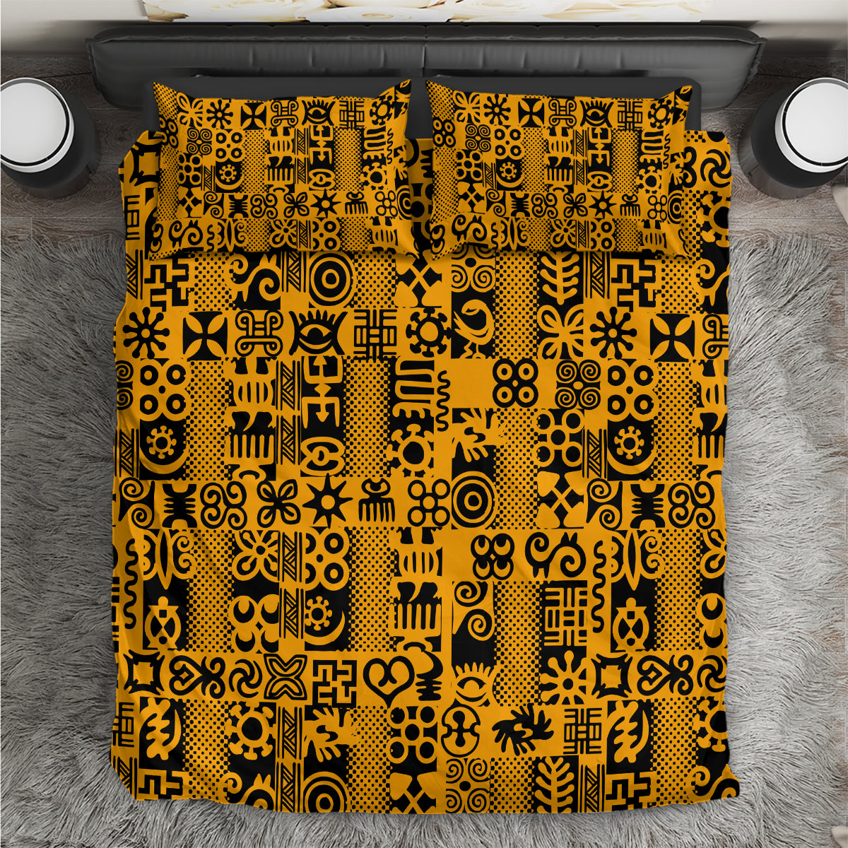 Close-up yellow and black patterned duvet cover with two matching pillow shams