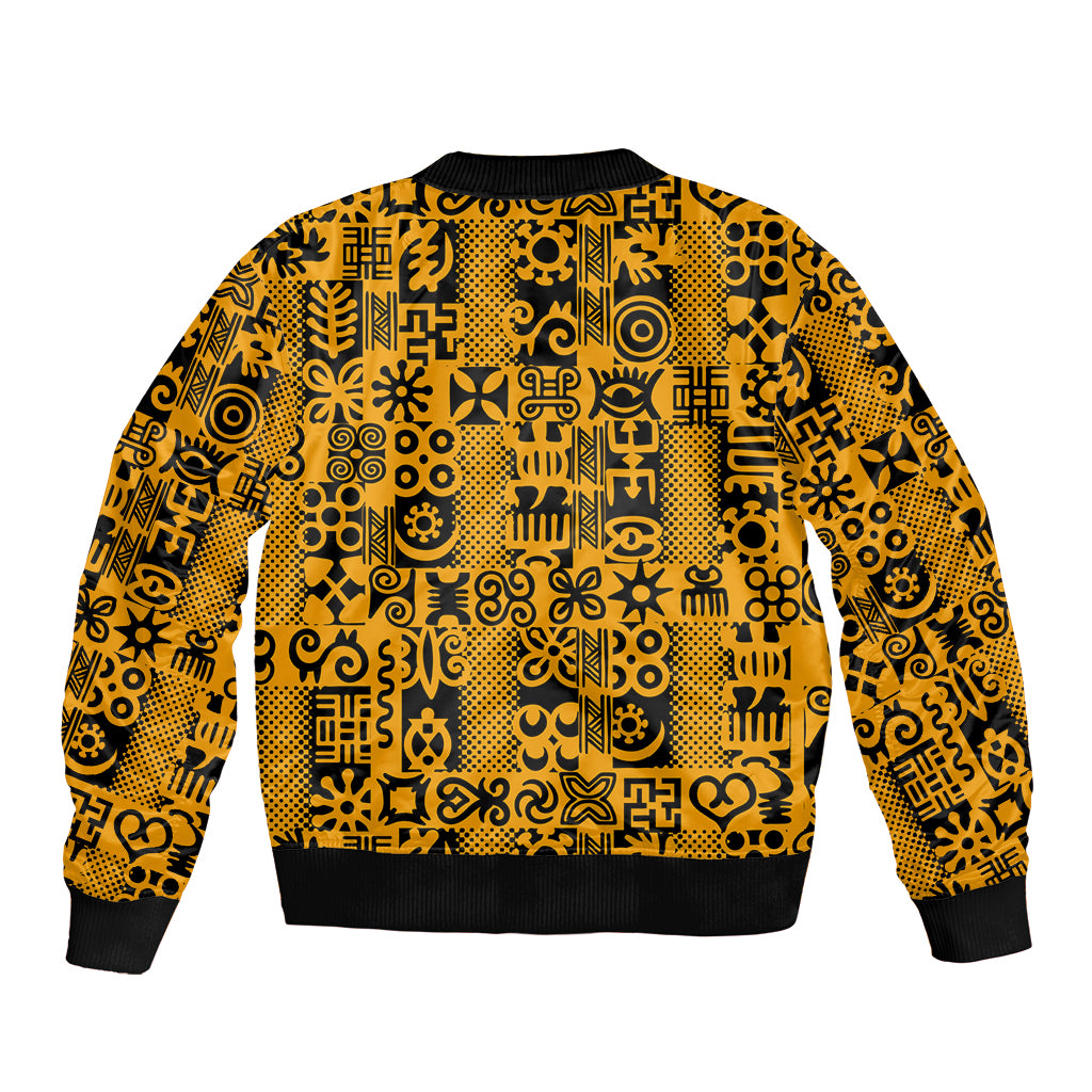 Yellow bomber jacket back with black Adinkra-inspired pattern and ribbed collar cuffs.