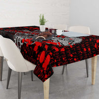 Red and black Viking warrior tablecloth covering a table with hanging edges