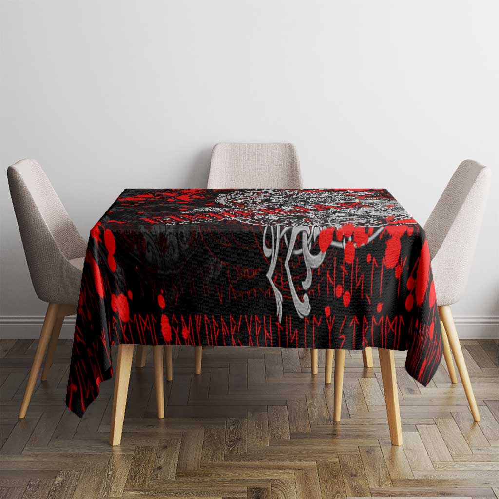 Red and black Viking warrior tablecloth on table with four light chairs