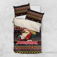 Black Christmas bedding set with Santa graphic and “Family & Friends” slogan on quilt