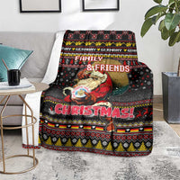 Black Christmas blanket on floor near chair, Santa and Family & Friends design