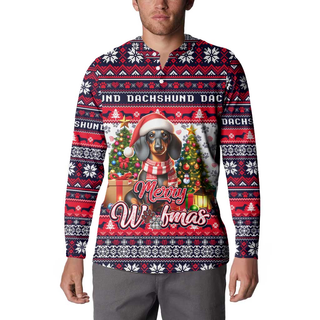 Man wearing red, white, and navy button sweatshirt with dachshund Woofmas graphic