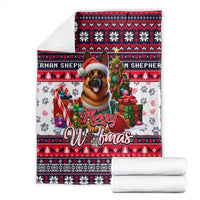 Folded Christmas dog art blanket, red navy and white with “Merry Woofmas” wording