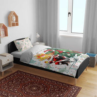 Christmas T-Rex bedding set with green dinosaur Santa on duvet and pillowcase prints