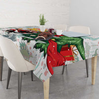 White dinosaur Christmas tablecloth with Merry Beermas banner, Santa and T-Rex scene.