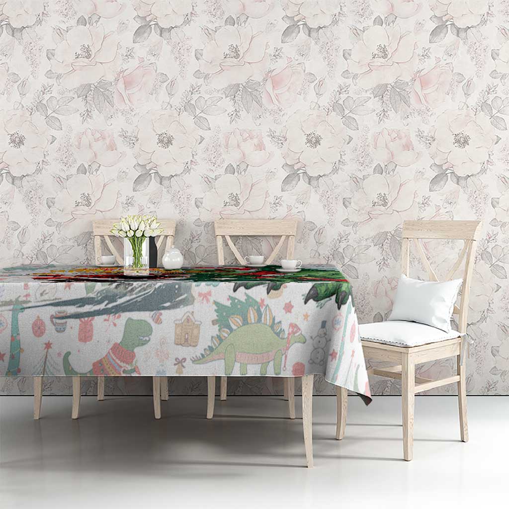 White tablecloth with dinosaur silhouettes and Merry Beermas greeting over dining set.