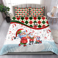 Christmas duvet cover and pillowcases with Santa figures, red and green diamond check border
