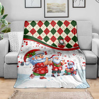Santa-themed Christmas golf blanket with red and green plaid edge and Santa characters on white