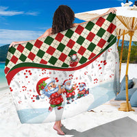 Christmas sarong wrap in white with red green argyle top border and Santa figures