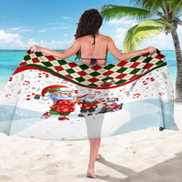 Christmas sarong wrap, white with red green argyle band and cartoon Santa artwork