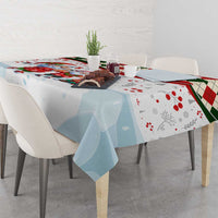 Square Christmas tablecloth with winter Santa illustration and light blue printed base