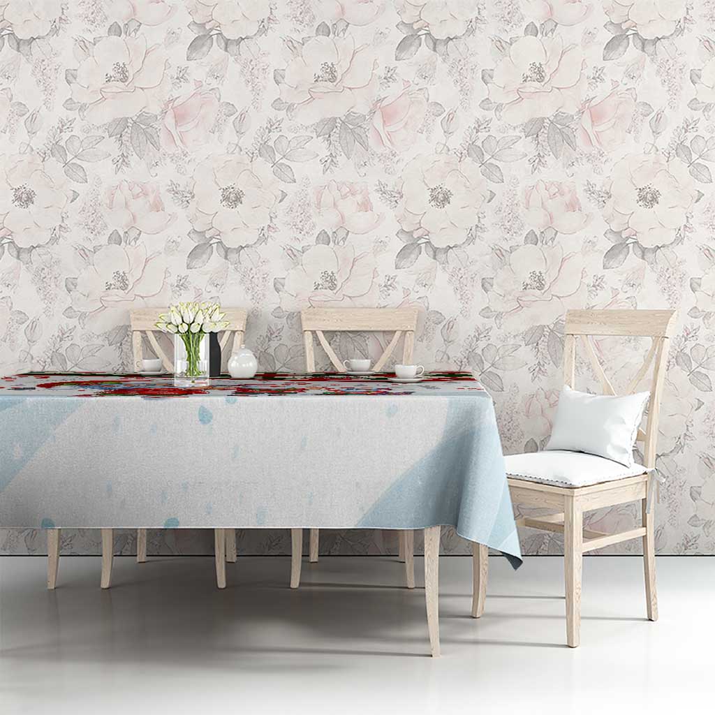 Christmas tablecloth on dining table, light blue drape with red-trim winter details