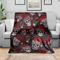 Christmas skull patterned blanket draped over a sofa, dark maroon with green drink motifs