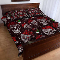 Red and dark quilt bed set with skull pattern and two pillow shams, shown on bed