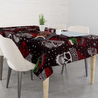 Square Christmas tablecloth with black skulls, red speckles, and green chili graphics