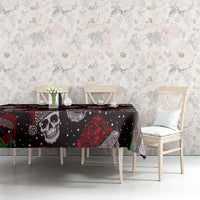 Long Christmas tablecloth featuring black skulls, red details, and green chili motifs