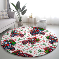 Round Christmas carpet showing multiple Santa motorbikes and greenery, red and green on white