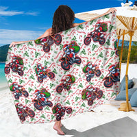 White sarong with colorful motorbike and Santa character print, draped wide