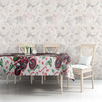 Christmas tablecloth covering table: white with red green motorbike Santa design, skirt drape