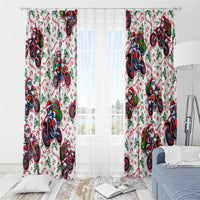 White window curtains with Santa on motorbikes repeat design; pair with sheer light behind.