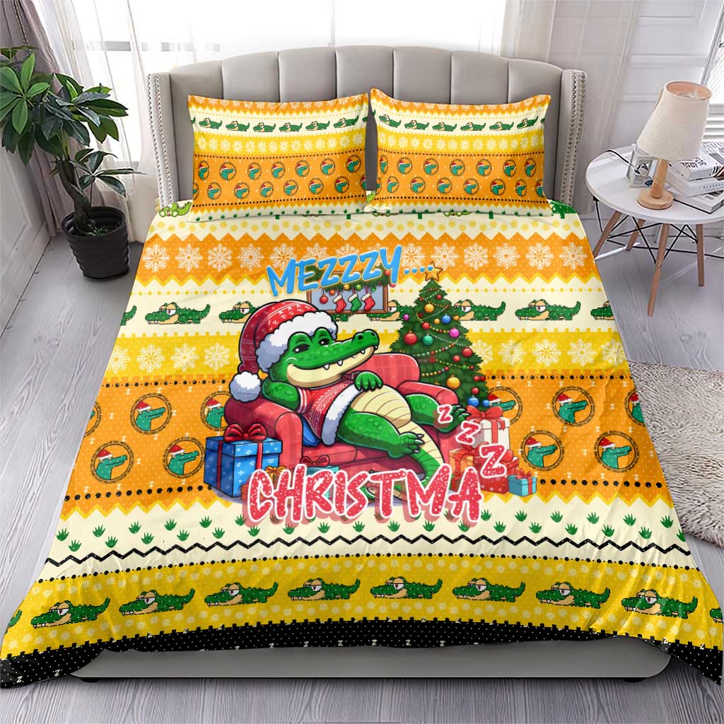 Yellow duvet and two pillowcases featuring a sleeping cartoon crocodile Christmas design