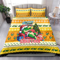 Yellow duvet and two pillowcases featuring a sleeping cartoon crocodile Christmas design
