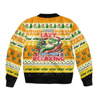 Yellow unisex bomber jacket, ribbed black cuffs and hem, back graphic with festive text