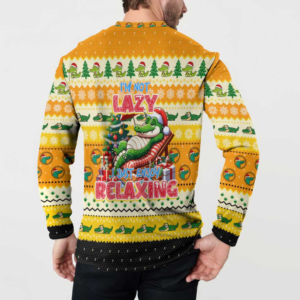 Yellow Christmas button sweatshirt worn by model, back crocodile sleigh graphic with slogan