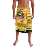 Yellow patterned lavalava shorts with festive graphics and black trim