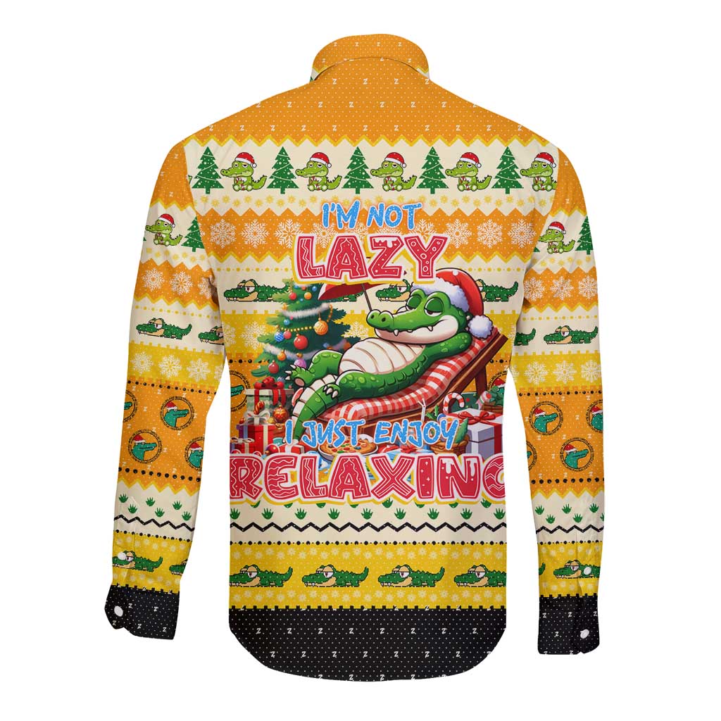 Yellow long-sleeve button-up shirt, back view with crocodile Christmas text and pine trees