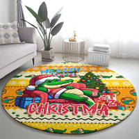 Yellow round Christmas rug with cartoon crocodile, tree lights, 'MEZZZY' and 'CHRISTMAS'