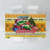 Yellow Christmas tablecloth with cartoon crocodile, tree, and festive lettering
