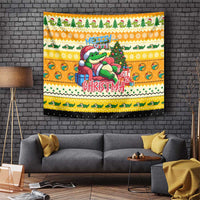 Yellow Christmas tapestry with cartoon alligator, tree, and red 'CHRISTMA' lettering